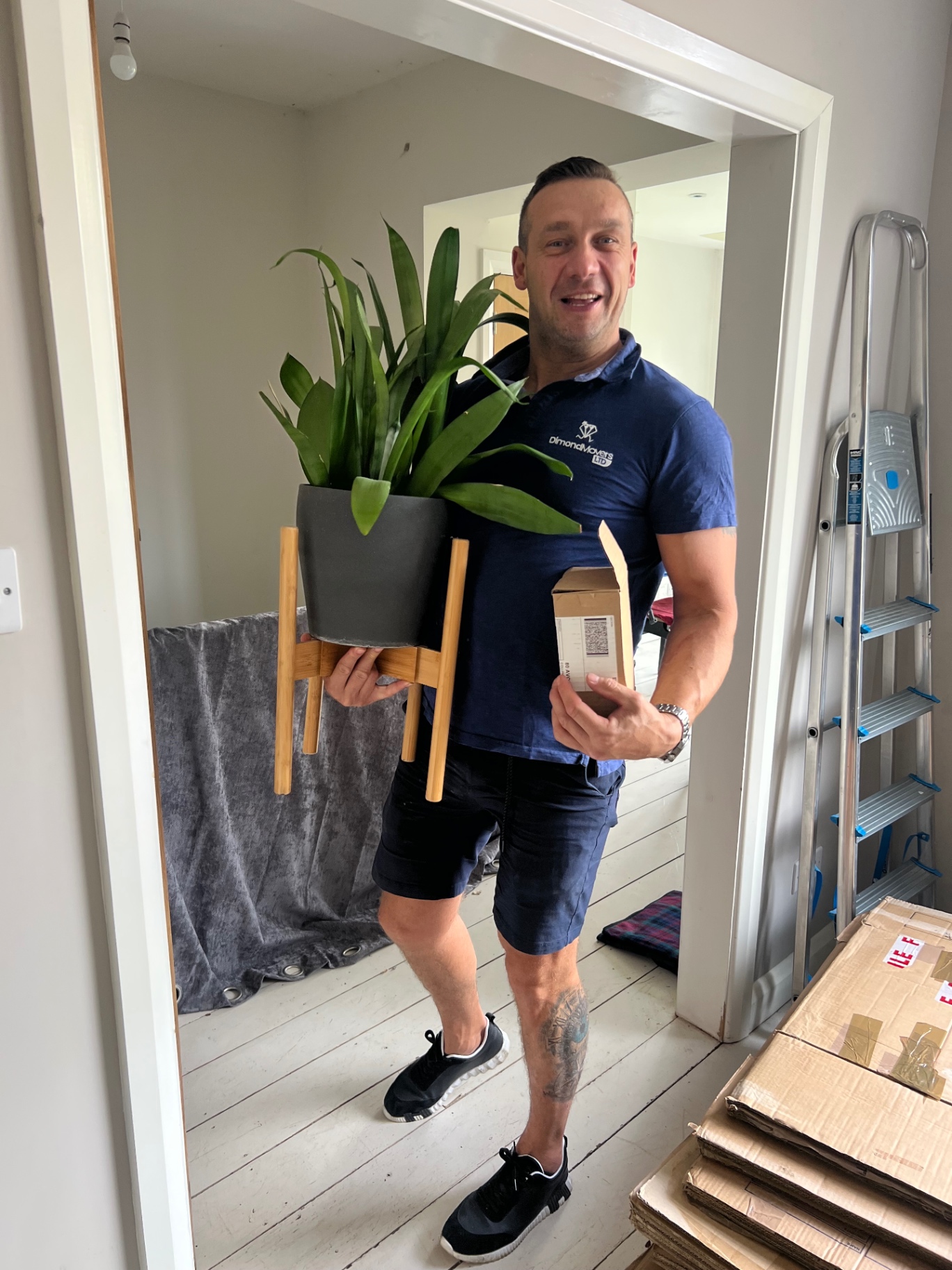Careful furniture handling on a Bristol to Bristol move Dimond Movers carrying an oak chest of drawers