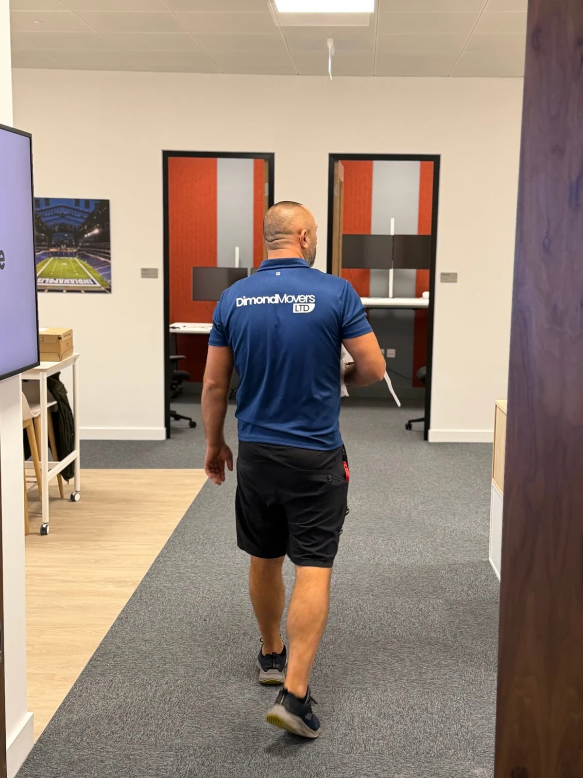 Dimond Movers team member working inside the Walter P Moore office
