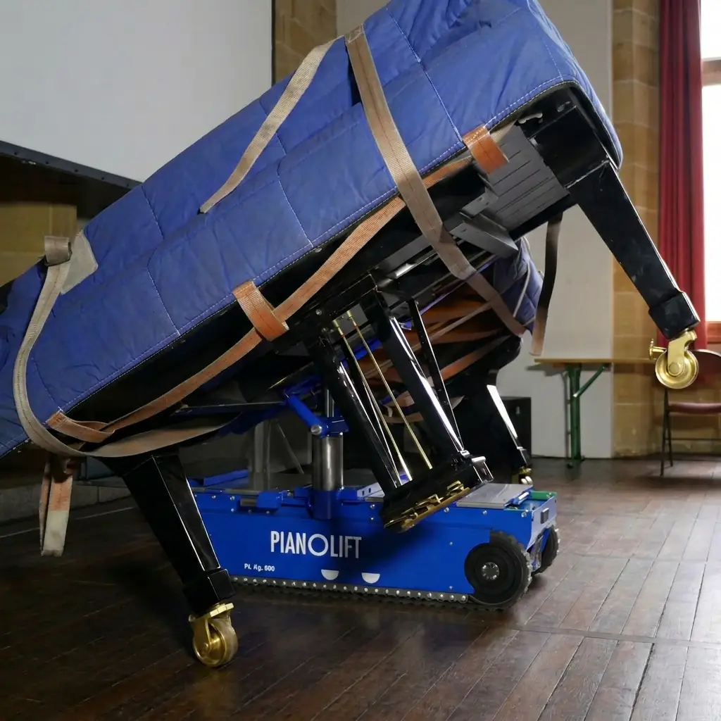 Dimond Movers piano removals Oxford — crew handling a wrapped piano